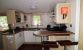Well equipped kitchen with breakfast bar, full size fridgefreezer, oven etc..